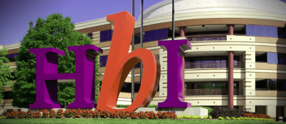 HBI logo in front of building